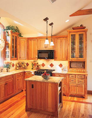 
The kitchen optimizes energy efficient appliances with a G.E. Energy Star microwave and stove (www.geappliances.com) and minimizes chemical outgassing with formaldehyde-free cabinetry installed by Randy Starry Woodworks.
